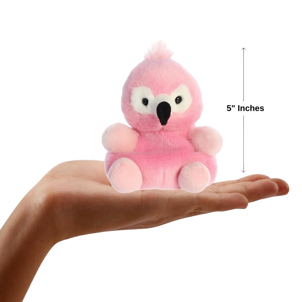 Dimension graphic showing the 5-inch Aurora Palm Pals Pinky Flamingo resting comfortably in a person's hand.