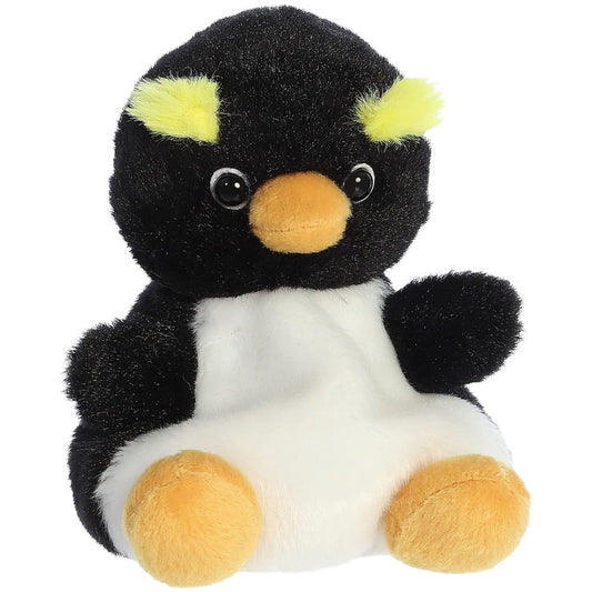 Aurora 5-inch Palm Pals Rocco Rockhopper Penguin plush toy showing its black and white body, vibrant yellow eyebrow crests, orange beak, and plush feet.
