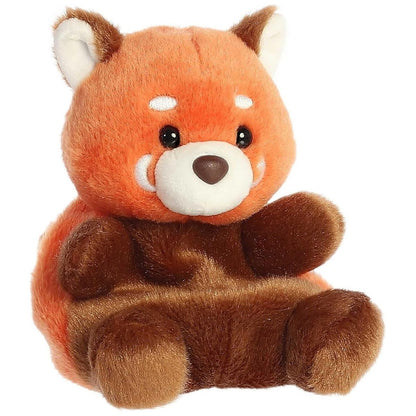 Aurora 5-inch Palm Pals Rei Red Panda plush toy sitting at an angle showing its vibrant rust-orange head, dark brown body and limbs, white muzzle, and distinctive white brow markings.