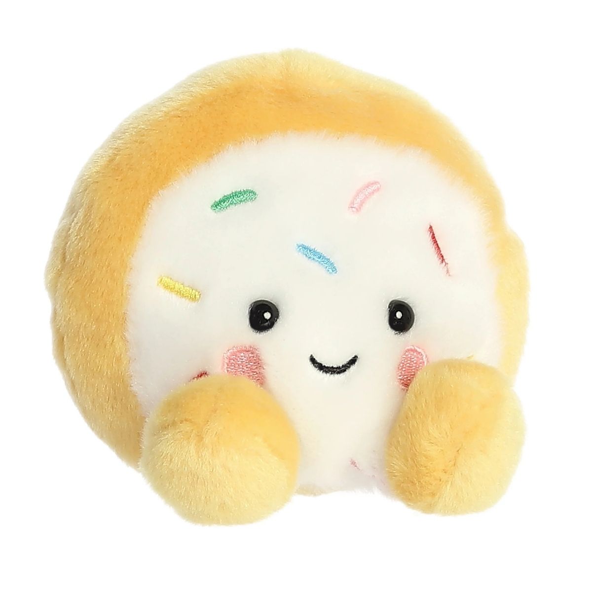 Front view thumbnail of the cute Crumble Cookie plush sitting straight, highlighting its dark safety eyes, small grin, and tiny golden-tan front feet.
