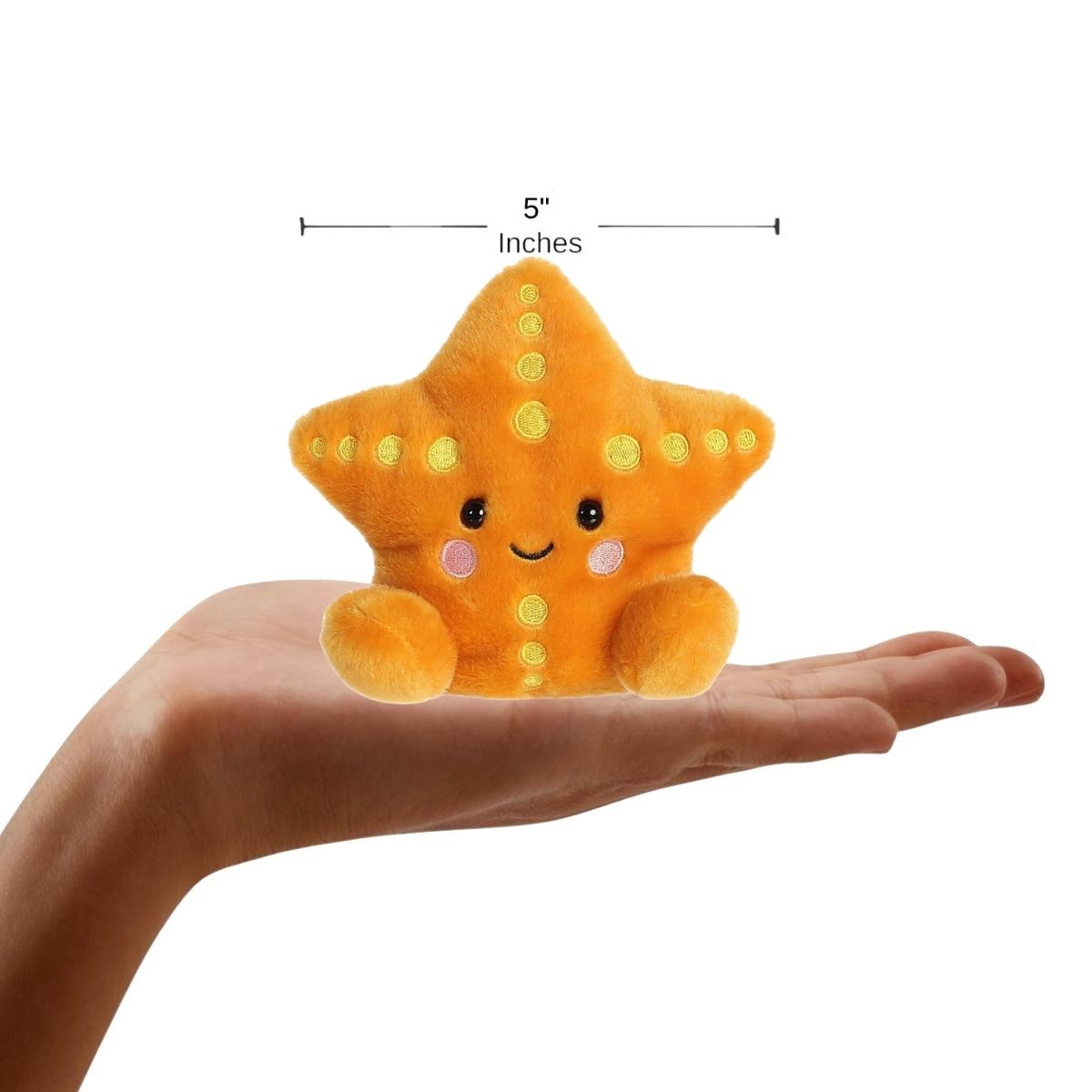 Sizing graphic showing the 5-inch Palm Pals Treasure Starfish sitting perfectly in the palm of a person's hand to demonstrate its miniature scale.