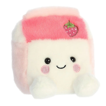 Aurora 5-inch Palm Pals Fresa Strawberry Milk plush toy sitting at an angle showing its milk carton shape, cream face, pink sides, hot pink top flap, and an embroidered mini strawberry.
