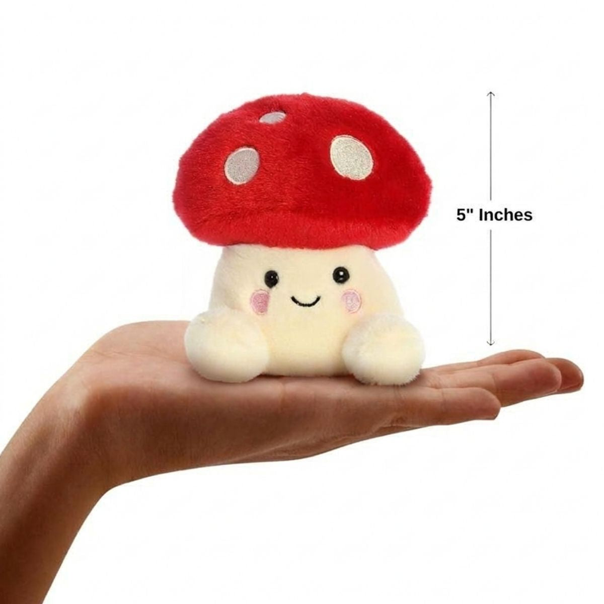 The miniature Amanita Mushroom plush sitting balanced in an open human hand under a 5-inch height graphic indicator.