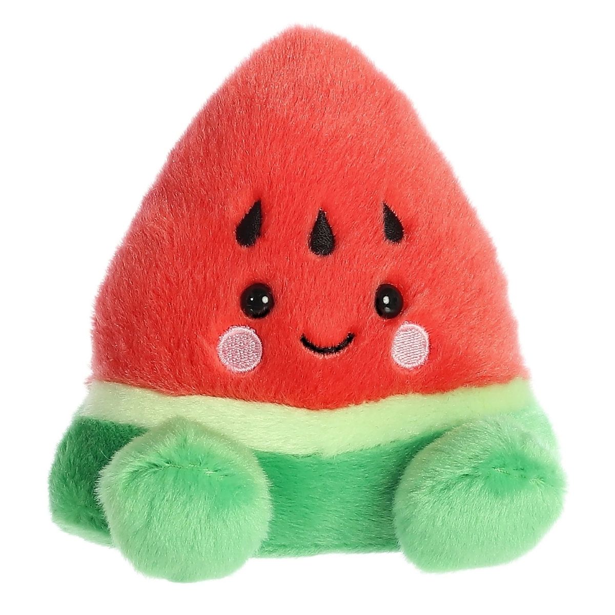 Aurora 5-inch Palm Pals Sandy Watermelon plush toy showing its triangular red slice body, green rind base, three embroidered black seeds on its forehead, and a sweet smiling face with blushing cheeks.