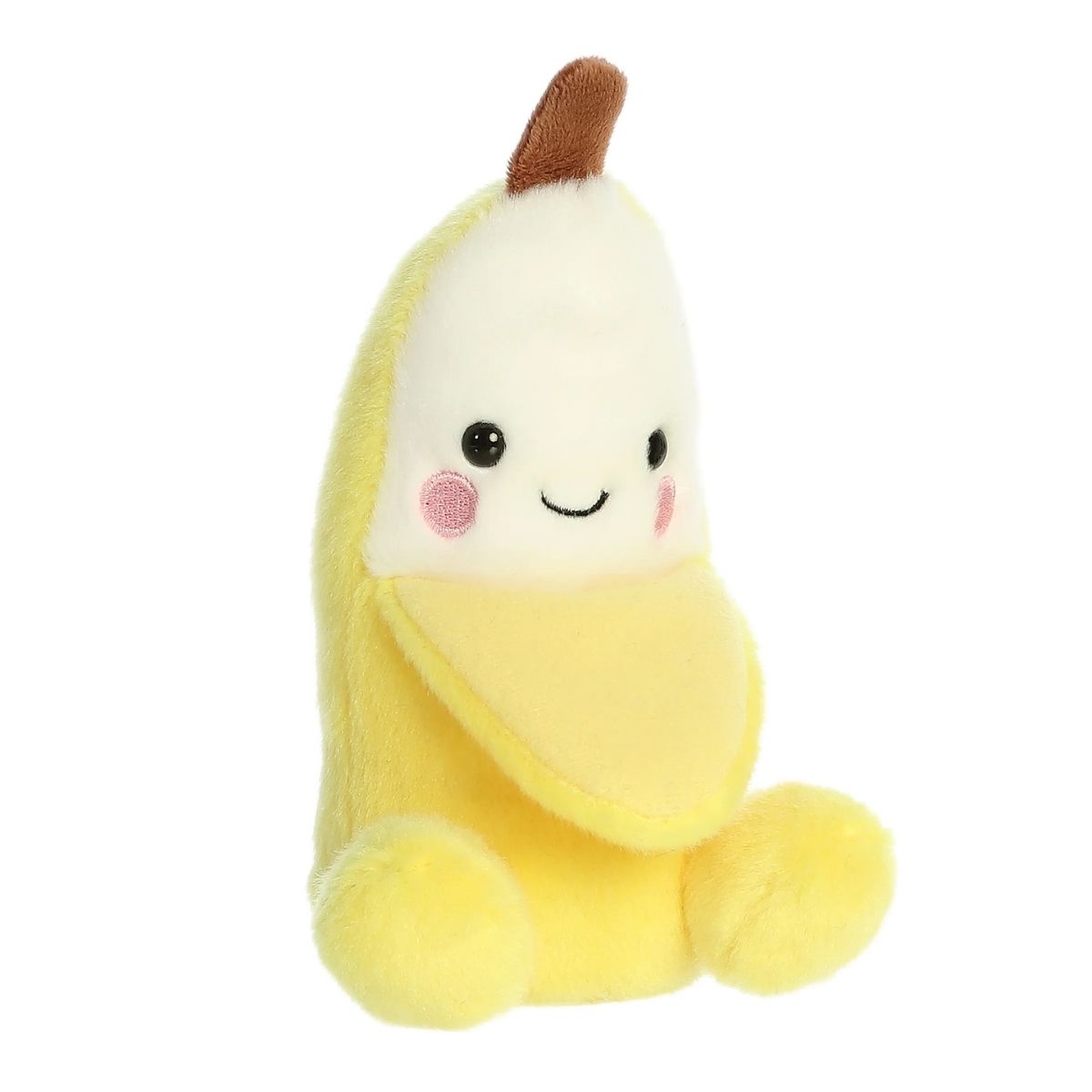 Aurora 5-inch Palm Pals Gwen Banana plush toy sitting at an angle showing its bright yellow peel partially opened to reveal a cream face with a stitched smile, rosy cheeks, and a brown top stem.