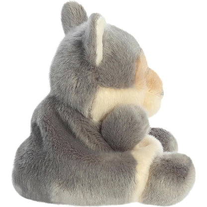 Side profile view of the Lucian Wolf stuffed animal highlighting his plump shape and soft grey back.