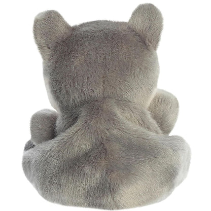 Back view of the Aurora wolf plush showcasing his grey fur and little tail.
