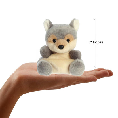 Sizing graphic showing the 5-inch Palm Pals Lucian Wolf sitting perfectly in the palm of a person's hand to demonstrate its miniature scale.