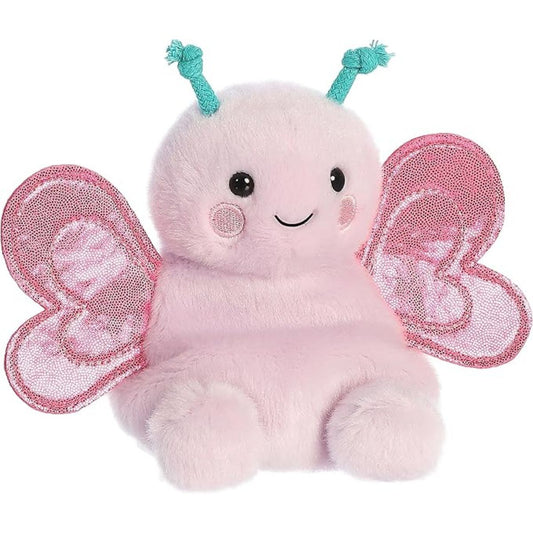 Aurora 5-inch Palm Pals Petunia Butterfly plush toy sitting forward showing its pastel pink body, glittering pink heart-shaped wings, and teal knotted antennae.