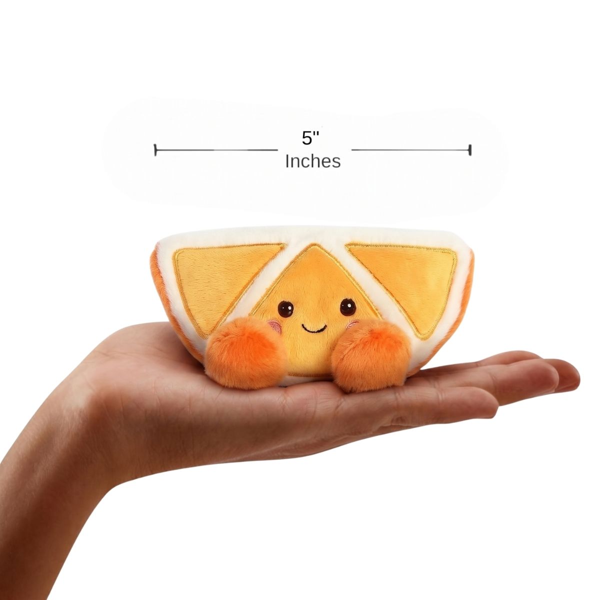 The miniature Tucker Mandarin plush sitting balanced in an open human hand under a 5-inch width graphic indicator.