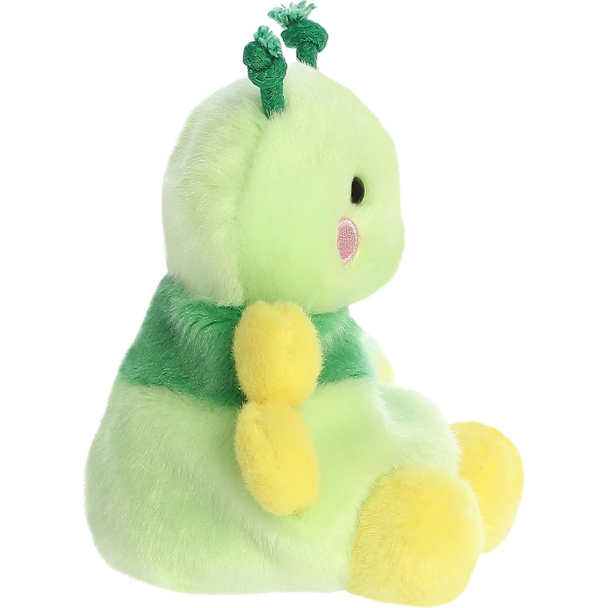 Left side profile view of the sitting caterpillar plush showing its rounded head and stacked multi-layered green body.