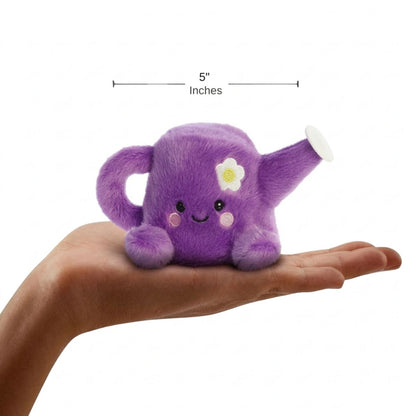 The miniature Flo Watering Can plush sitting balanced in an open human hand under a 5-inch height graphic indicator.
