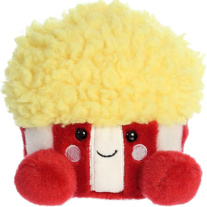 Front view of the adorable Aurora Butters Popcorn stuffed animal featuring rosy pink cheeks, dark eyes, a sweet smile, and little red feet.