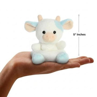 The miniature Skyla Blueberry Cow plush sitting balanced in an open human hand under a 5-inch height graphic indicator.