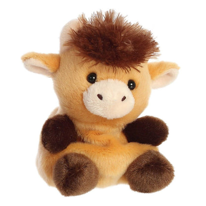 Aurora 5-inch Palm Pals Hubert Highland Cow plush toy sitting at an angle showing its golden-tan fur, shaggy dark brown head tuft, cream muzzle, and dark brown hooves.