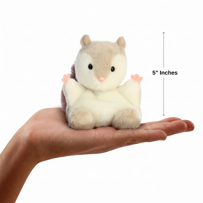 The miniature Flaps Flying Squirrel plush sitting balanced in an open human hand under a 5-inch height graphic indicator.