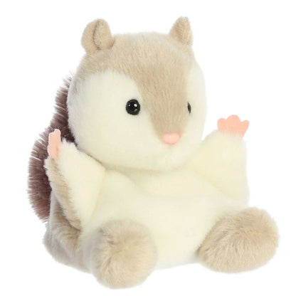 Aurora 5-inch Palm Pals Flaps Flying Squirrel plush toy sitting at an angle showing its taupe-grey fur, creamy white belly, extended gliding wings, and a cute pink nose.