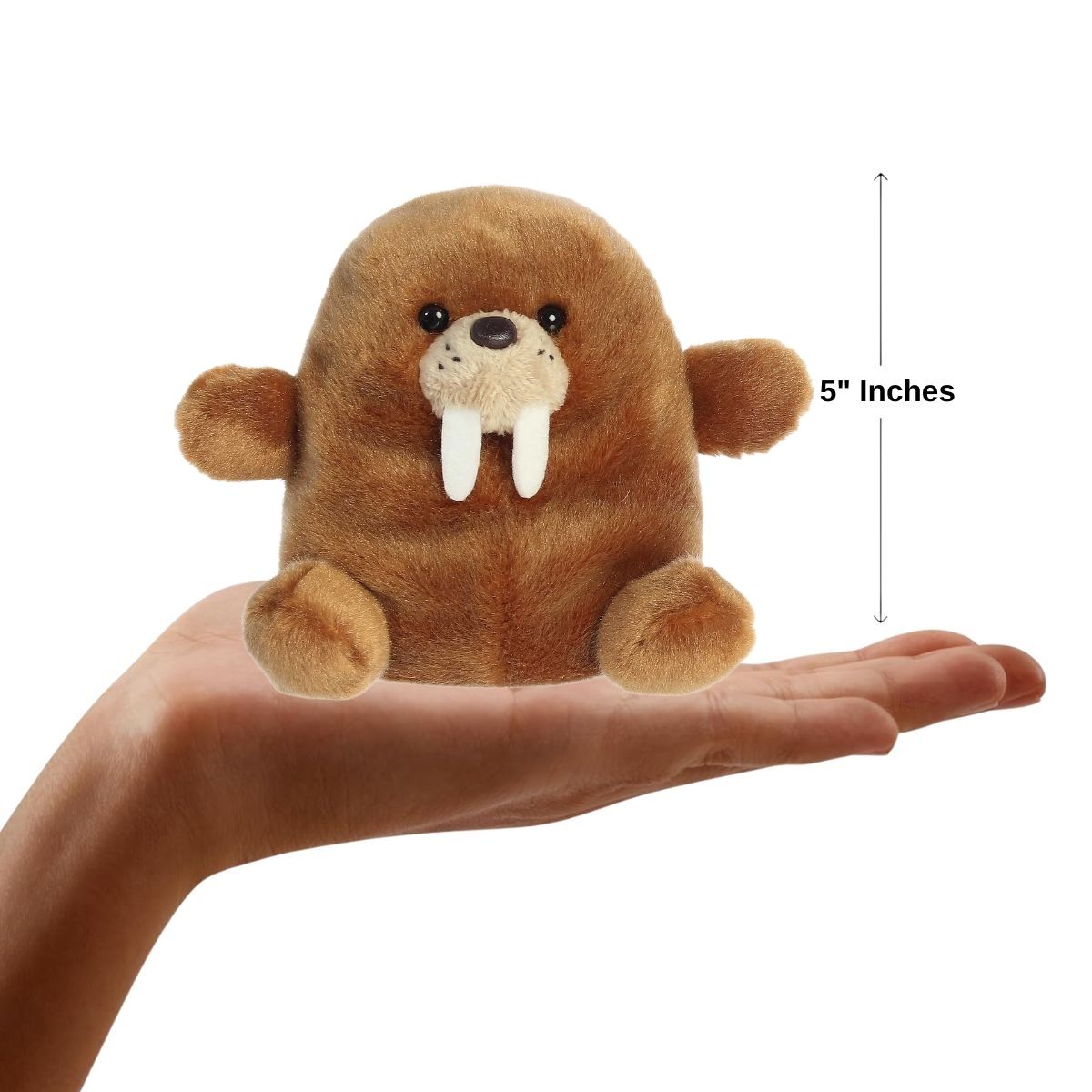 Sizing graphic for the Aurora Palm Pals Waldo Walrus plush showing it sitting perfectly in the palm of a hand, indicating a total height of 5 inches.