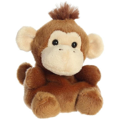 Aurora 5-inch Palm Pals Boomer Monkey plush toy sitting at an angle showing its chocolate brown fur, cream face and ears, and spiky hair tuft.