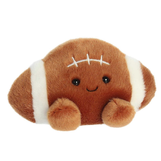 Front view thumbnail of the cute Tackle Football plush sitting straight, highlighting its dark safety eyes, cheerful stitched grin, and small brown feet.