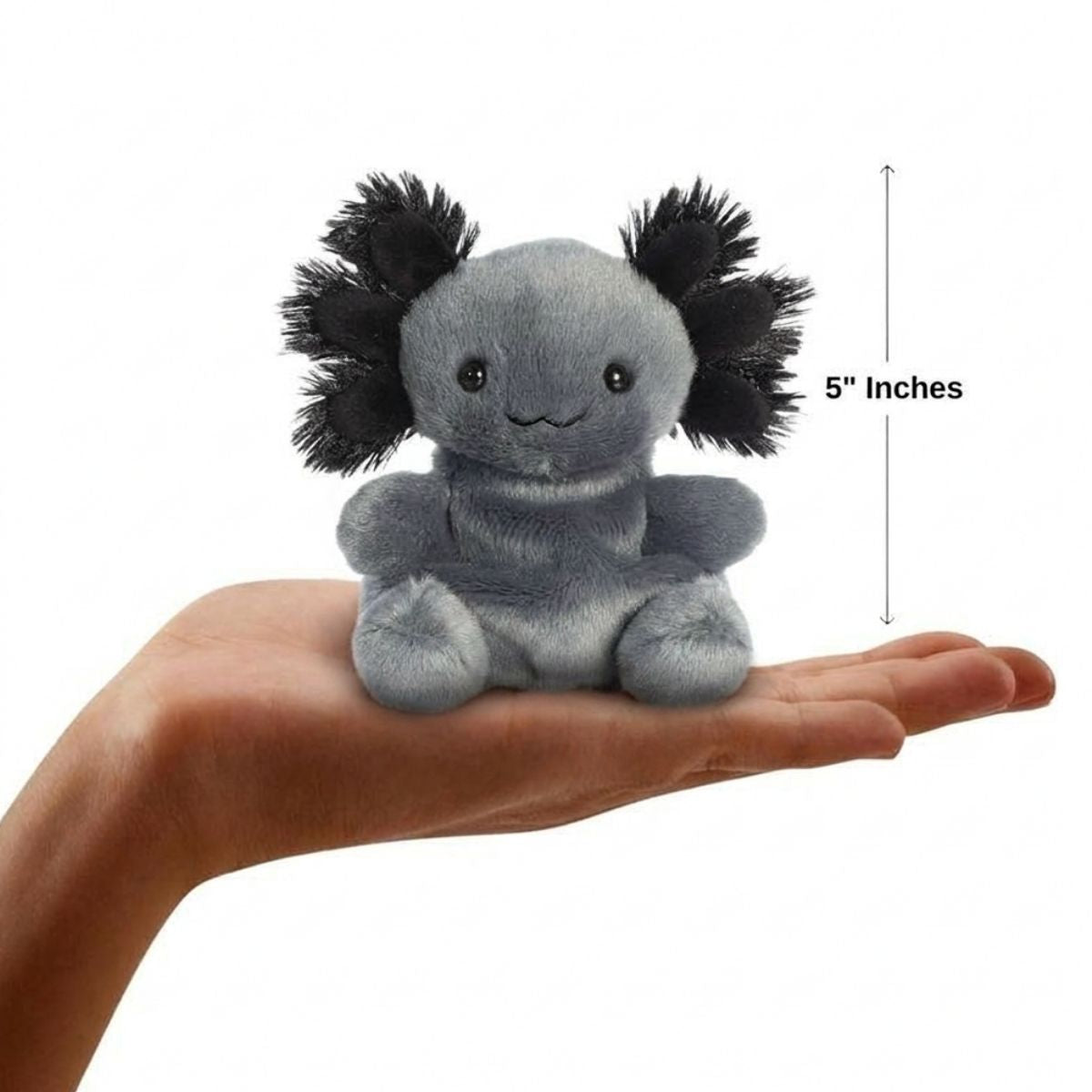 The miniature Onyx Axolotl plush sitting balanced in an open human hand under a 5-inch height graphic indicator.