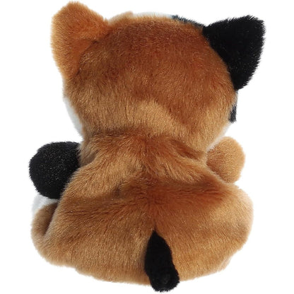 Rear view thumbnail of the Aurora calico cat stuffed toy displaying its predominantly brown plush back, black ears, and short black tail tip.