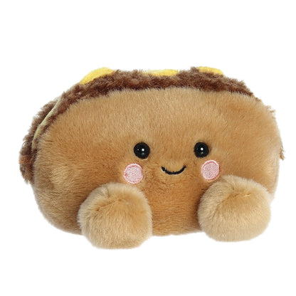Aurora 5-inch Palm Pals Mike Philly Cheesesteak plush toy showing its tan hoagie roll body, fluffy dark brown steak filling, yellow melted cheese ribbon, and a cute smiling face.