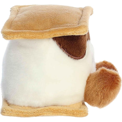 Side profile view of the Palm Pals S'more plush highlighting its squishy marshmallow middle and the layer of plush chocolate.