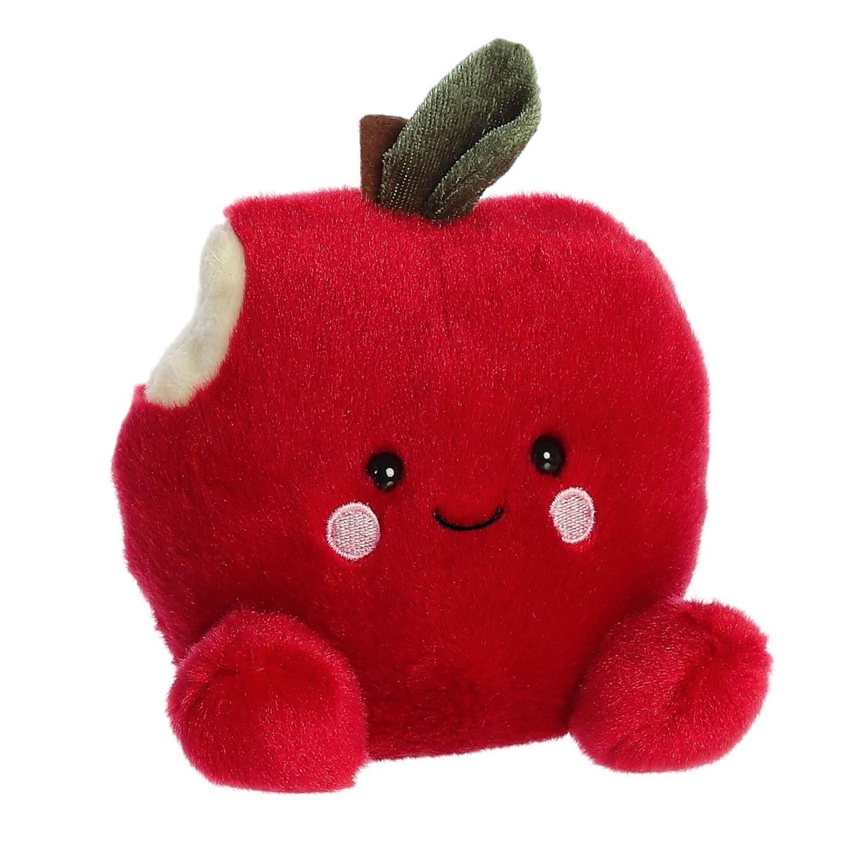 Aurora 5-inch Palm Pals Crisp Red Apple plush toy showing its vibrant red apple body, brown stem, green leaf, a cream-colored bite mark on the upper left, and a sweet smiling face with blushing cheeks.