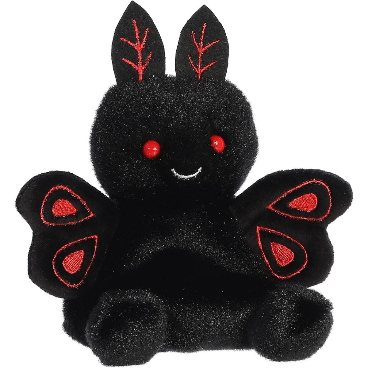 Aurora 5-inch Palm Pals Mortimer Mothman plush toy showing its solid black body, bright red eyes, small white stitched smile, and black wings with red embroidered loop accents.