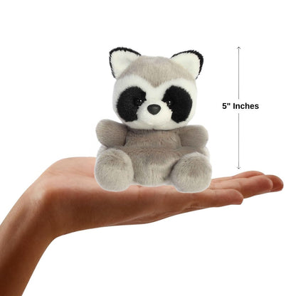 Sizing graphic for the Aurora Palm Pals Rascal Raccoon plush showing it sitting perfectly in the palm of a hand, indicating a total height of 5 inches.