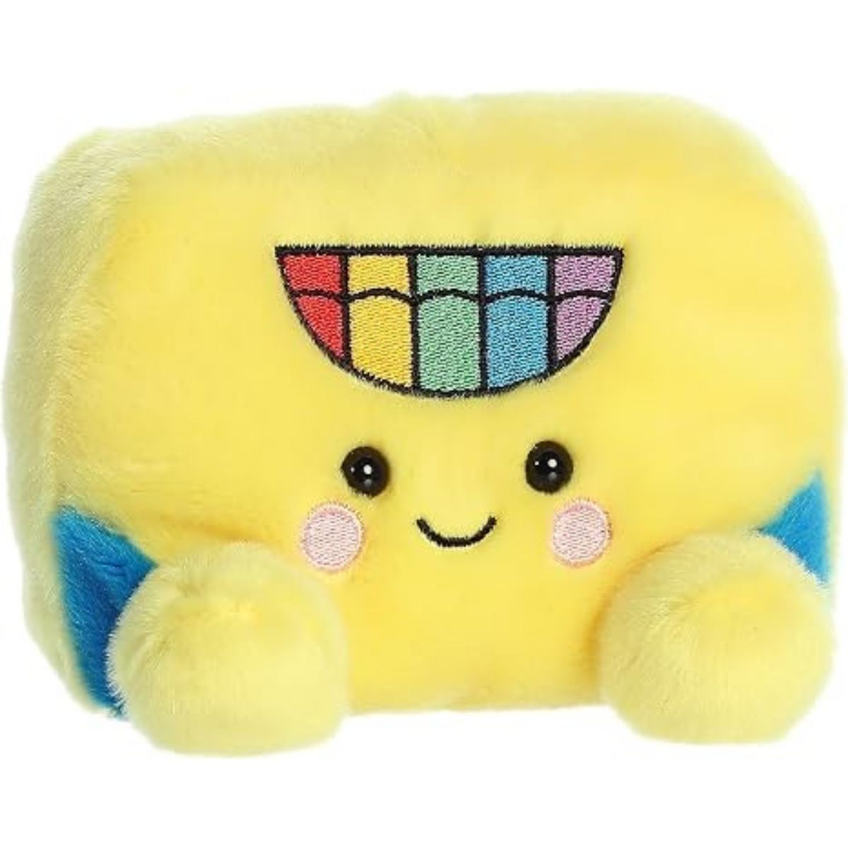Aurora 5-inch Palm Pals Doodle Crayon Box plush toy showing its rectangular yellow body, blue side accents, embroidered rainbow crayon tip logo, and a sweet smiling face with blushing cheeks.