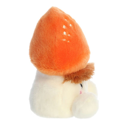 Side profile thumbnail of the mini mushroom plush showcasing its rounded orange cap, shaggy brown trim, and soft seated stem base.