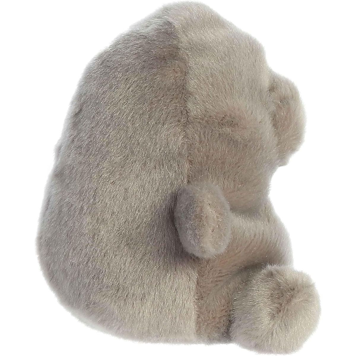 Side profile view of the Palm Pals Manatee plush highlighting its round, perfectly squishy bean-weighted body and little side flipper.