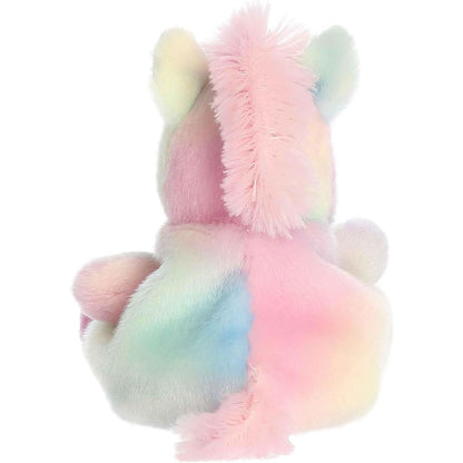 Back view of the cuddly pastel rainbow Palm Pals unicorn stuffed toy showing its pink mane and tail.