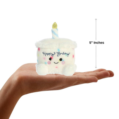 Dimension graphic showing the 5-inch Aurora Palm Pals Happy Bday Birthday Cake resting comfortably in a person's hand.
