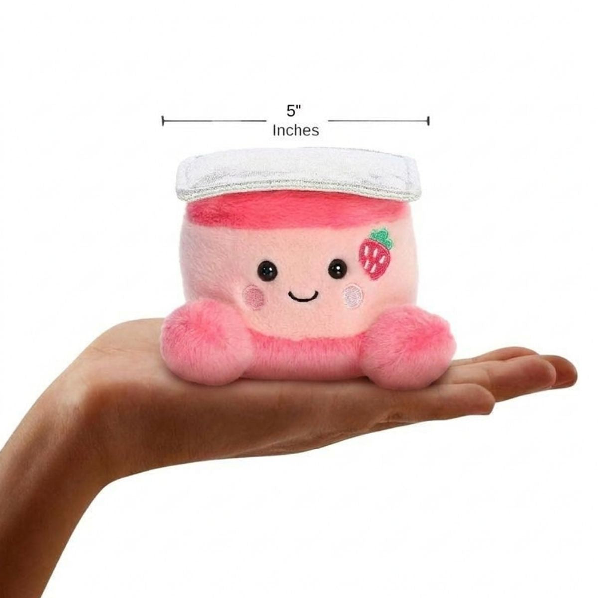The miniature Yona Strawberry Yogurt plush sitting balanced in an open human hand under a 5-inch height graphic indicator.