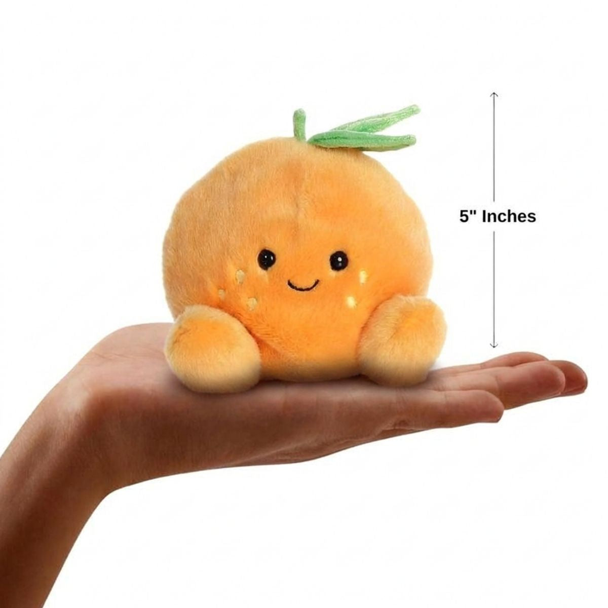 Sizing graphic for the Aurora Palm Pals Tangie Orange plush showing it sitting perfectly in the palm of a hand, indicating a total height of 5 inches.