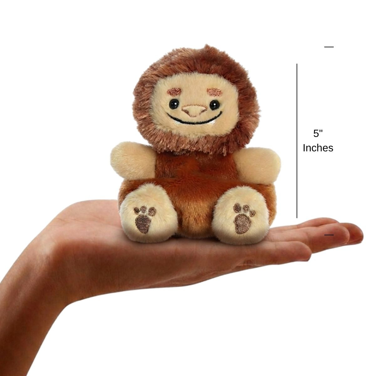 The miniature Brock Big Foot plush sitting balanced in an open human hand under a 5-inch height graphic indicator.
