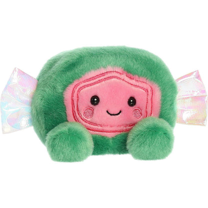 Aurora 5-inch Palm Pals Jetty Saltwater Taffy plush toy sitting forward showing its watermelon-themed green and pink candy body, sweet smiling face, and shiny iridescent wrapper ends.