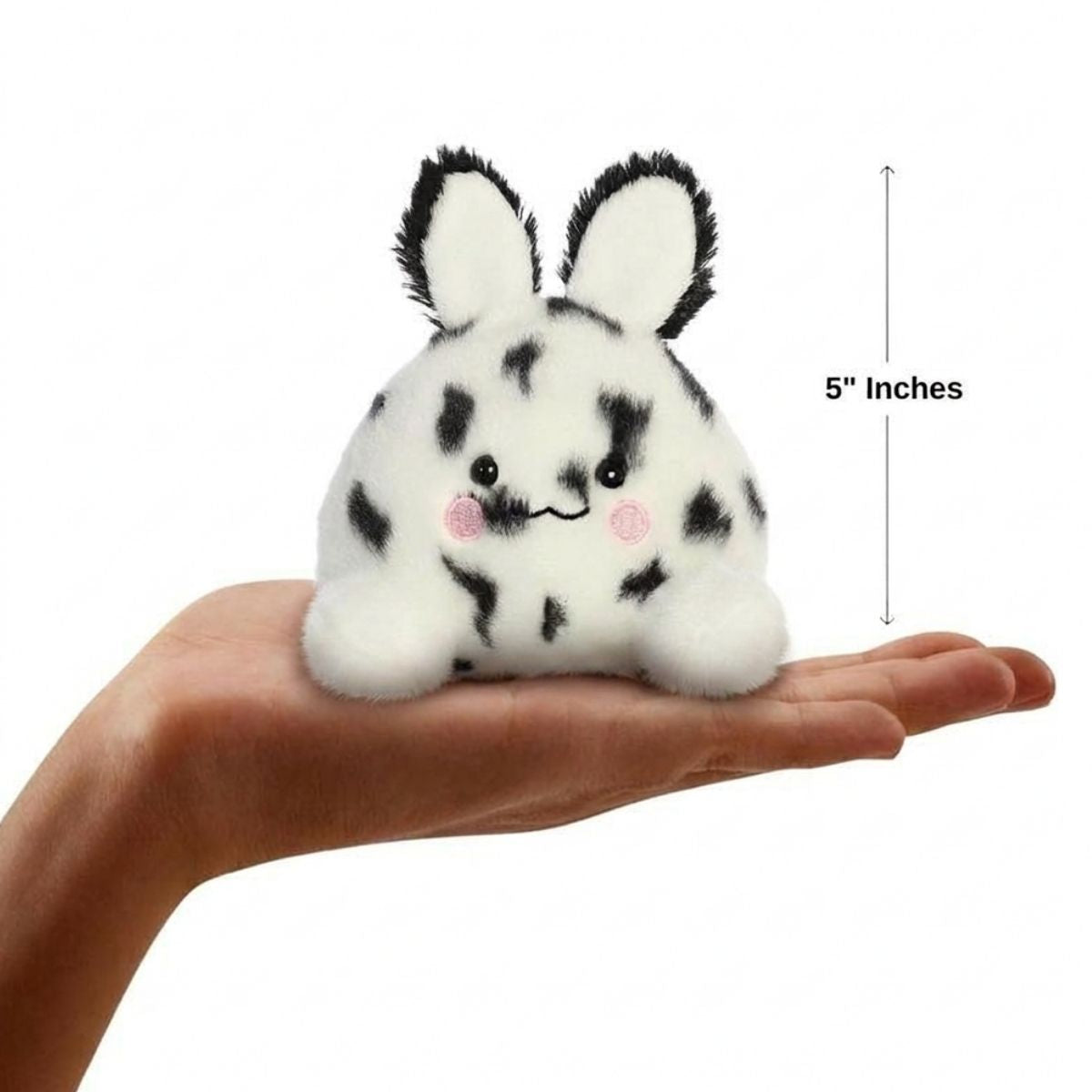 The miniature Usagi Sea Bunny plush sitting balanced in an open human hand under a 5-inch height graphic indicator.