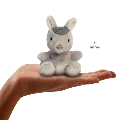 The miniature Antonia Armadillo plush sitting balanced in an open human hand under a 5-inch height graphic indicator.