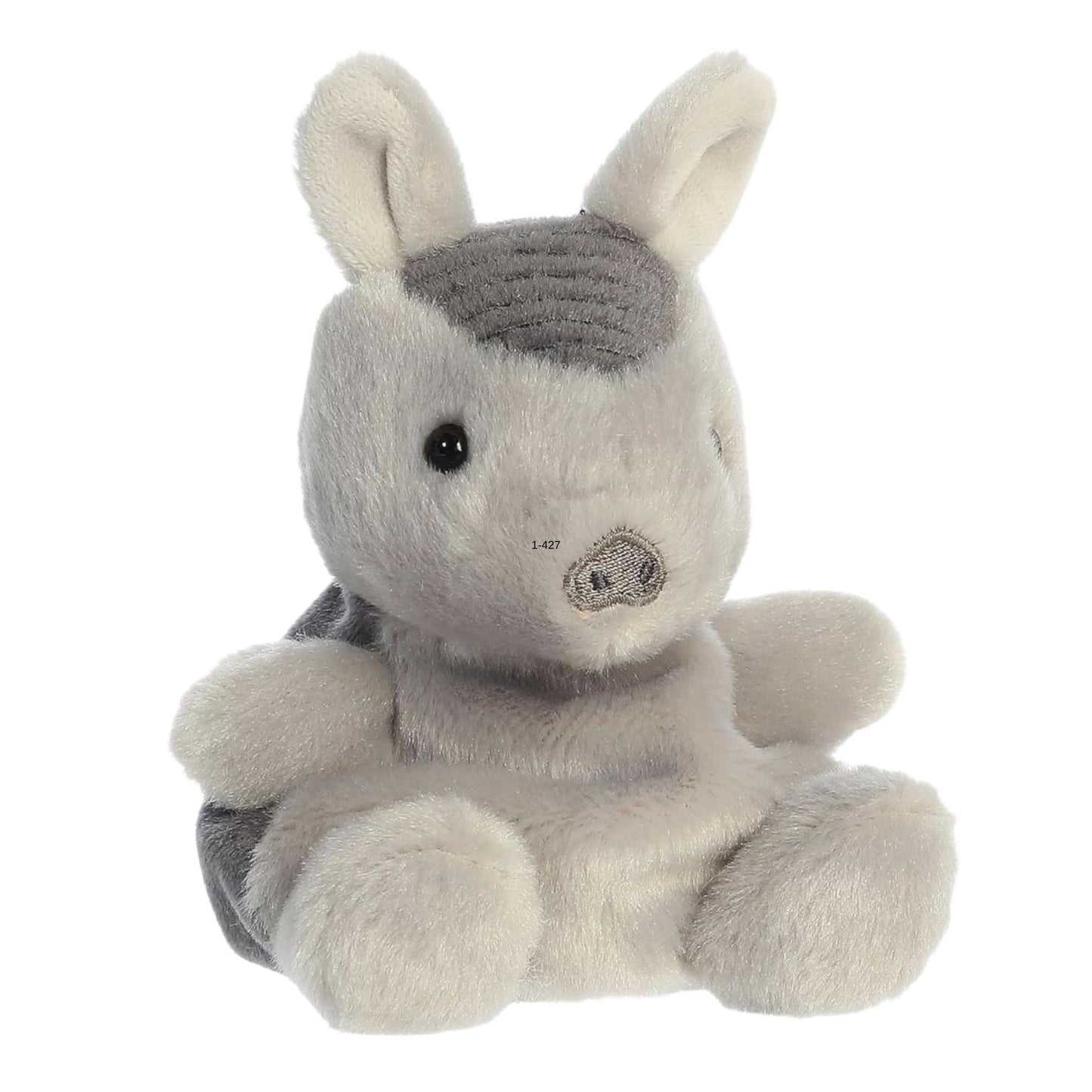 Plush toy rhino on a white background