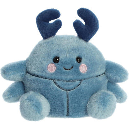 A close-up front portrait thumbnail of the Agatha Beetle plush showing its black eyes, pink cheeks, and multiple blue legs.