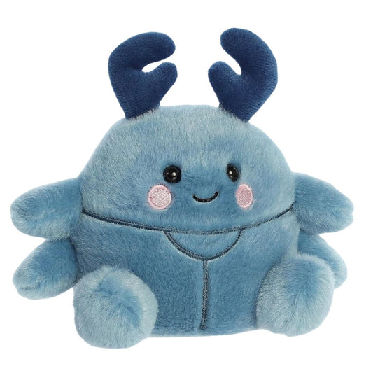 Aurora Palm Pals Agatha 5-inch Beetle plush stuffed toy sitting forward with a slate-blue body and dark blue horns.