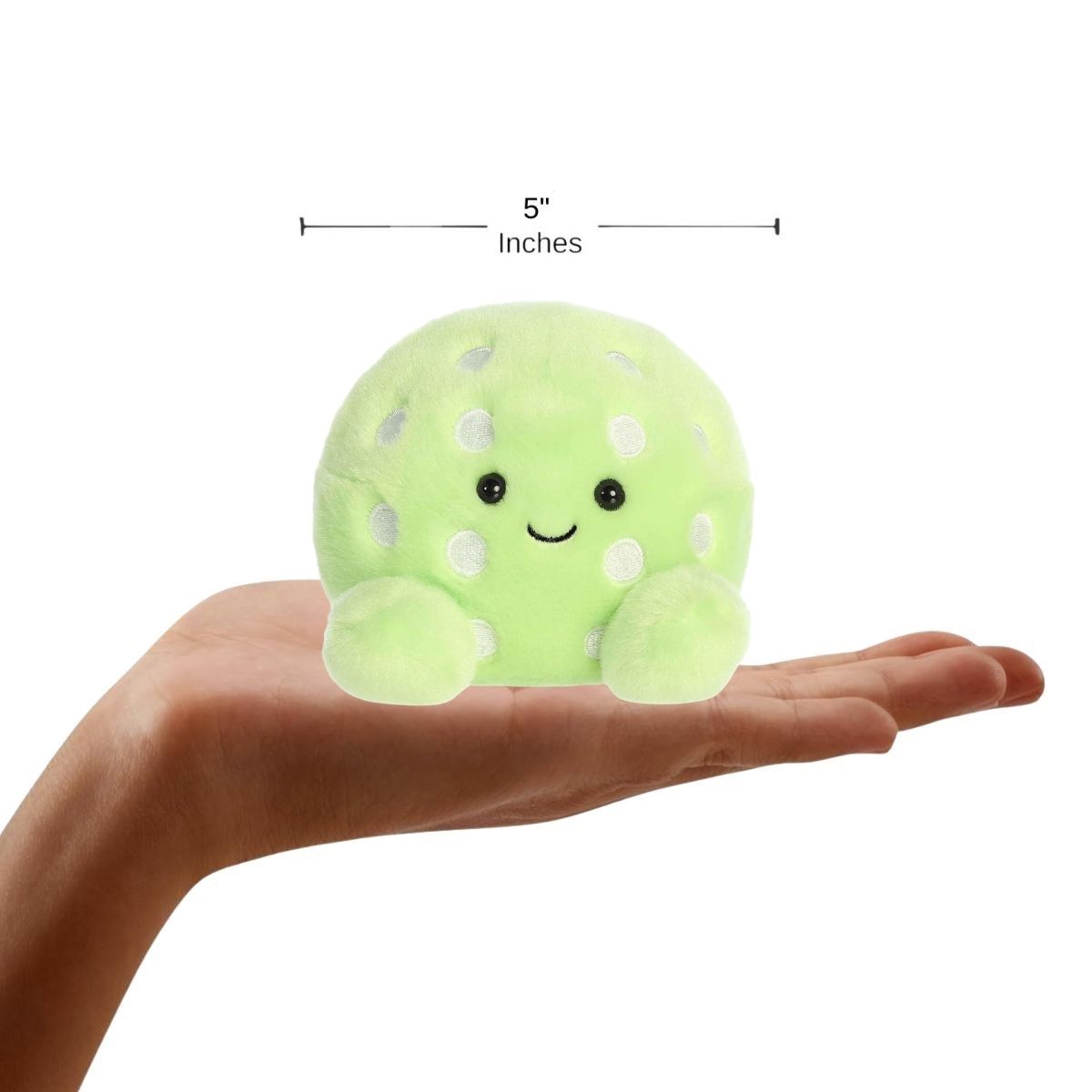 The miniature Steve Pickleball plush sitting inside an open human hand displaying a 5-inch width indicator graphic.