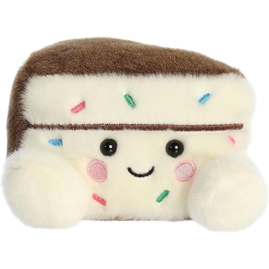Straight-on front view of the 4.5-inch Aurora Palm Pals Sprinkles Cake Slice stuffed animal showing its colorful sprinkles and smiling face.