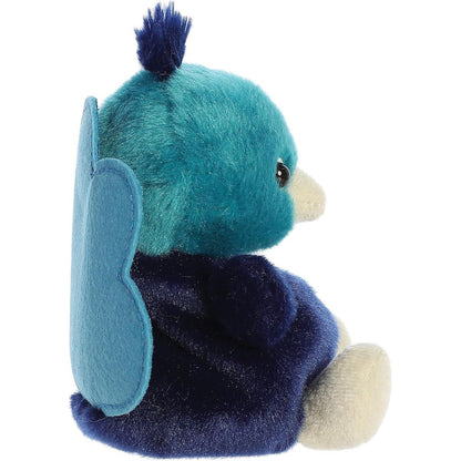The right side profile thumbnail of the sitting peacock plush highlighting its rounded navy body and upright teal tail feathers.