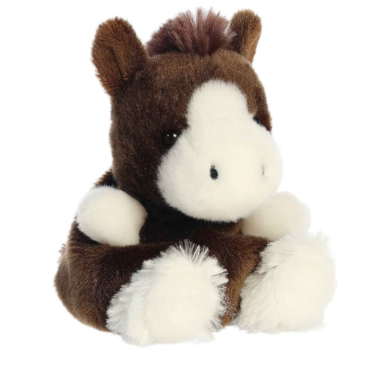 Aurora Palm Pals Darius 5-inch Clydesdale plush stuffed toy sitting forward with dark brown fur, a white facial blaze, and fluffy white hooves.