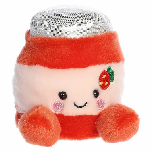 Three-quarter view of the Aurora Palm Pals JJ Strawberry Jelly 5-inch plush sitting upright, featuring a red and cream jar body, silver lid, and embroidered strawberry.